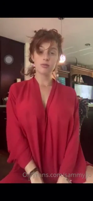 Sammyjjo, with pumped breasts, killing it in the adult video