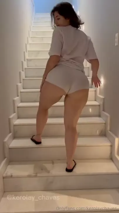 White fairy danced sensually in the railing of the home stairs