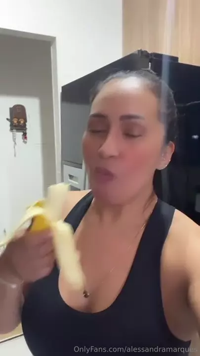 Alessandra Marques Saboring a Delicious Banana