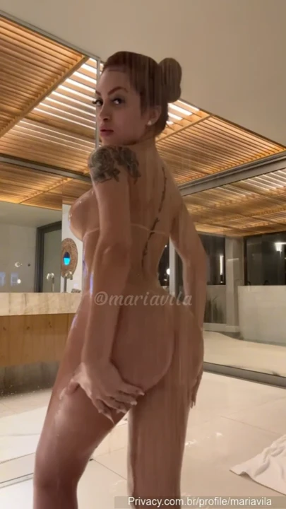 Mari Avila, full of attitude, showing off her curves in a bold way