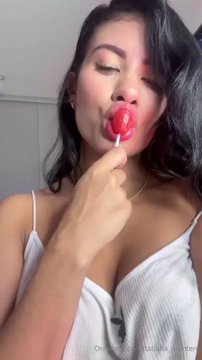 Tatiana Quintero Saboring a lollipop in a very provocative way